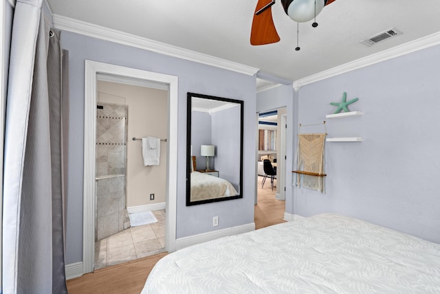 bedroom featuring crown molding, light wood-style floors, connected bathroom, and baseboards