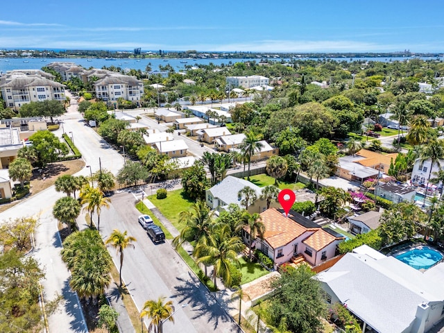 aerial view of residential area with a nearby body of water