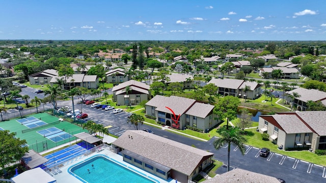 aerial perspective of suburban area with a pool