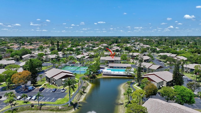 aerial view of residential area with a nearby body of water
