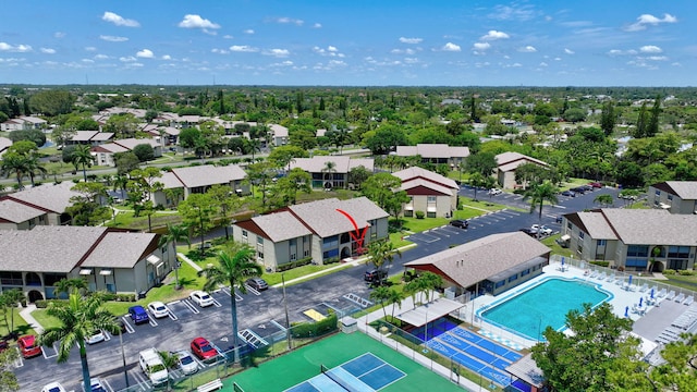 aerial view of residential area featuring a pool area