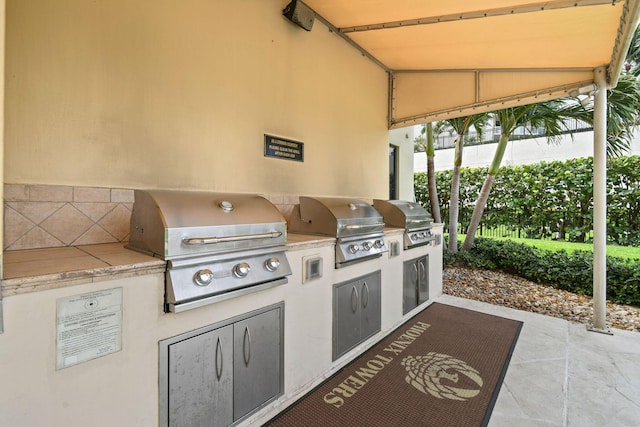 view of patio / terrace with grilling area and exterior kitchen