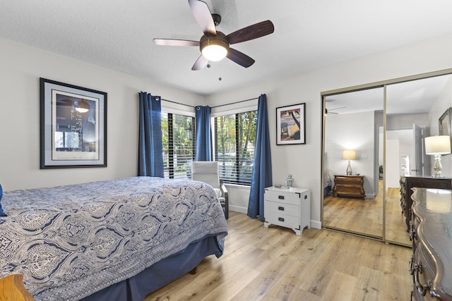 701 Sea Oats Dr Unit A-4, Juno Beach, FL 33408 - bedroom featuring light wood finished floors and a ceiling fan