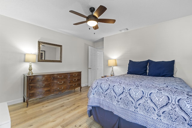 701 Sea Oats Dr Unit A-4, Juno Beach, FL 33408 - bedroom with wood finished floors and ceiling fan