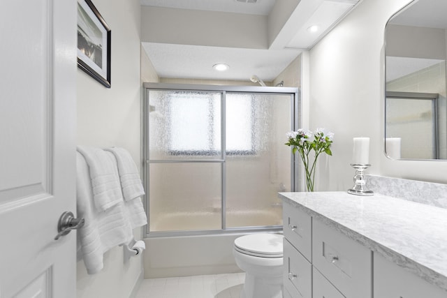 701 Sea Oats Dr Unit A-4, Juno Beach, FL 33408 - bathroom featuring vanity, shower / bath combination with glass door, tile patterned floors, and recessed lighting