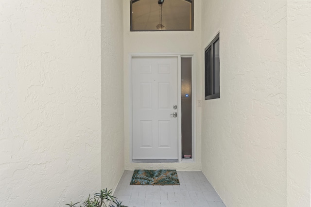 701 Sea Oats Dr Unit A-4, Juno Beach, FL 33408 - view of exterior entry with stucco siding