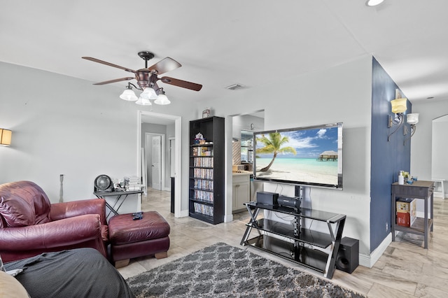 8611 NW 47th Ct, Lauderhill, FL 33319 - living room featuring ceiling fan, baseboards, and light marble finish floors