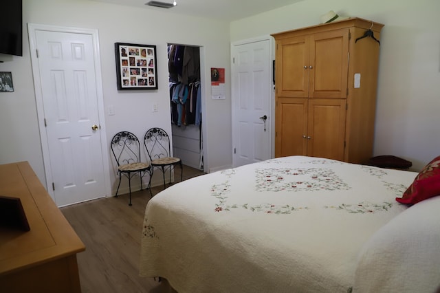 521 Sandpiper Cir, Delray Beach, FL 33445 - bedroom with wood finished floors and a closet