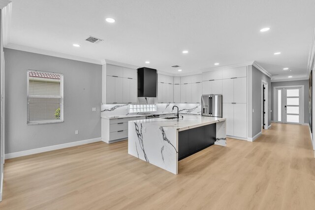 14838 Strand Ln, Delray Beach, FL 33446 - kitchen featuring crown molding, modern cabinets, a sink, baseboards, and recessed lighting
