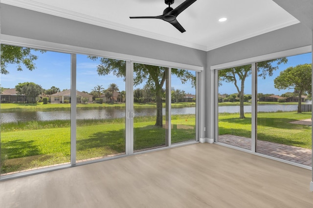 14838 Strand Ln, Delray Beach, FL 33446 - unfurnished sunroom with a water view, recessed lighting, wood finished floors, plenty of natural light, and ornamental molding