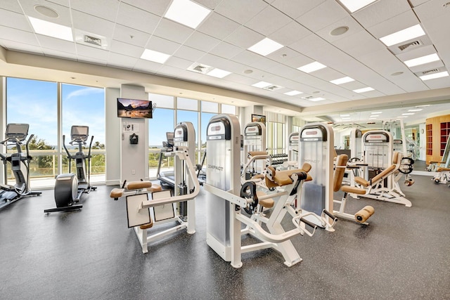 gym featuring a paneled ceiling