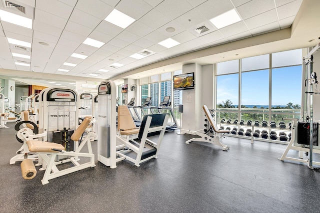 gym featuring a drop ceiling