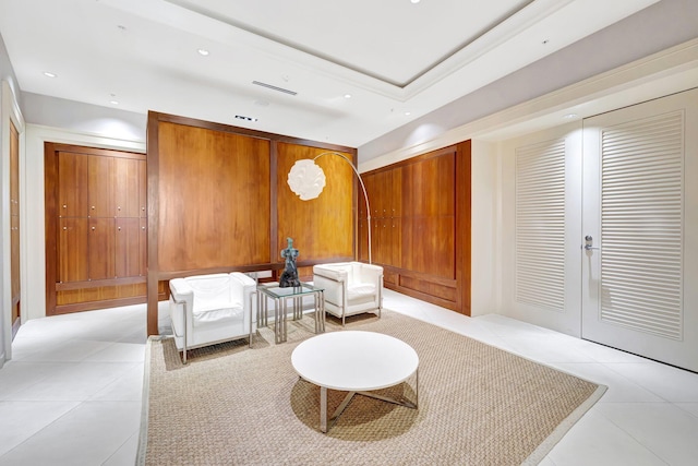 sitting room with light tile patterned floors and recessed lighting