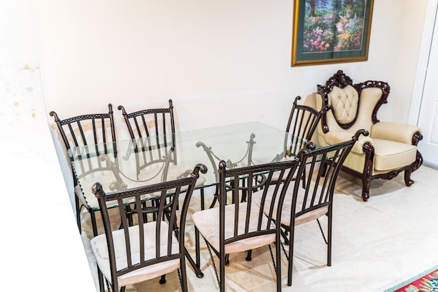 dining room featuring light tile patterned flooring