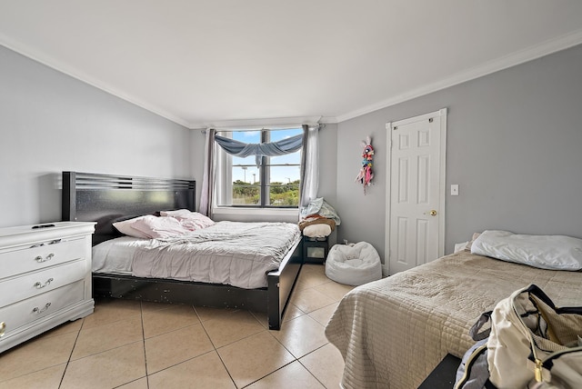 210 Lake Pointe Dr Unit 310, Oakland Park, FL 33309 - bedroom with ornamental molding and light tile patterned floors