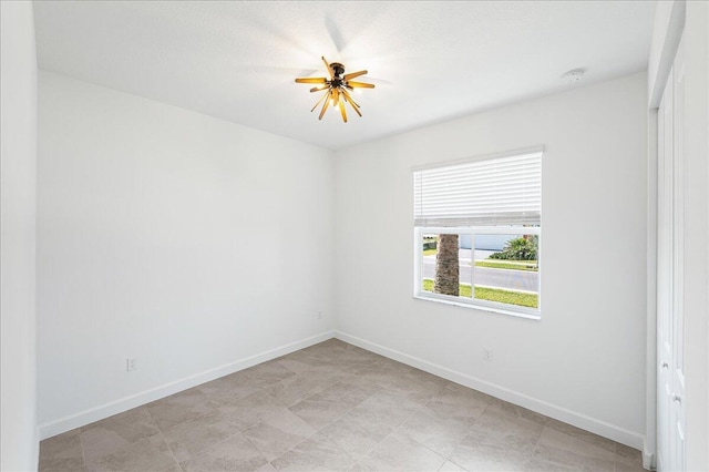 3527 Angler Dr, Fort Pierce, FL 34946 - unfurnished room with baseboards and ceiling fan