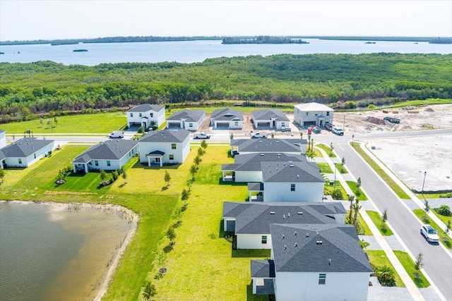 3527 Angler Dr, Fort Pierce, FL 34946 - aerial perspective of suburban area featuring a nearby body of water and a heavily wooded area