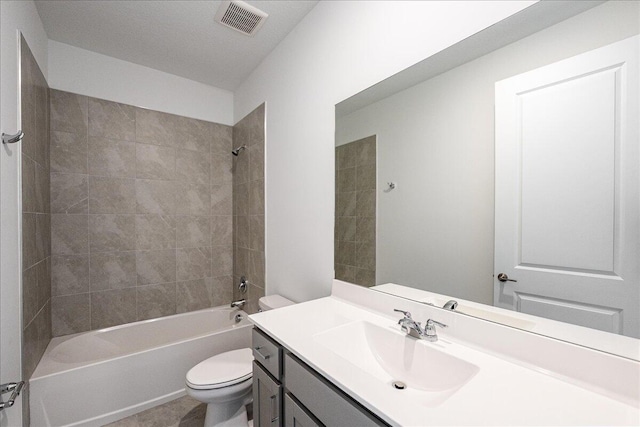 3527 Angler Dr, Fort Pierce, FL 34946 - full bathroom featuring toilet, washtub / shower combination, and vanity