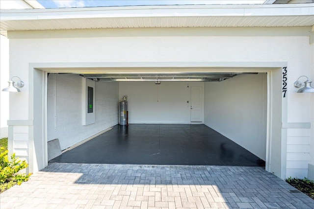 3527 Angler Dr, Fort Pierce, FL 34946 - garage with decorative driveway and electric panel