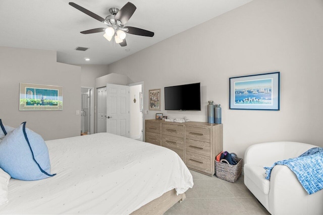 bedroom with light tile patterned floors and a ceiling fan