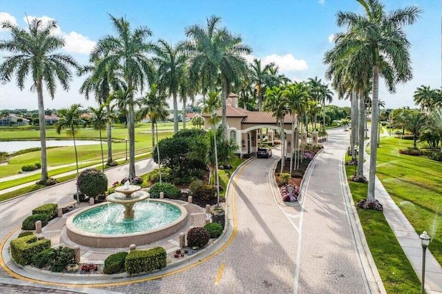 surrounding community with a water view