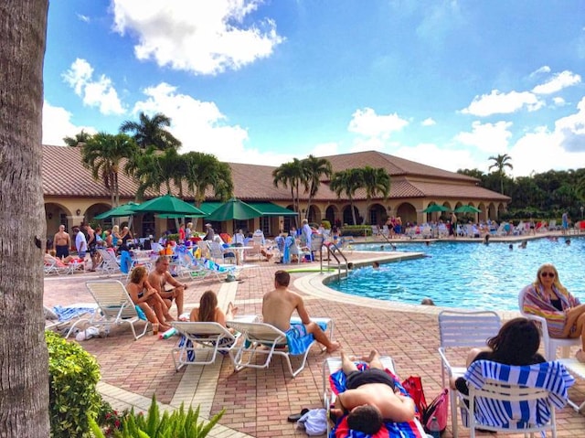 community pool featuring a patio