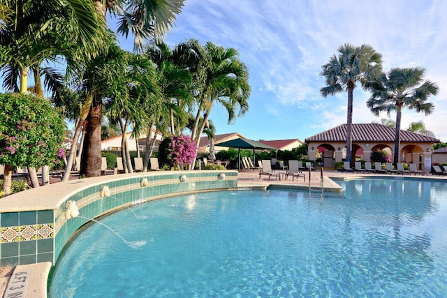 community pool with a patio