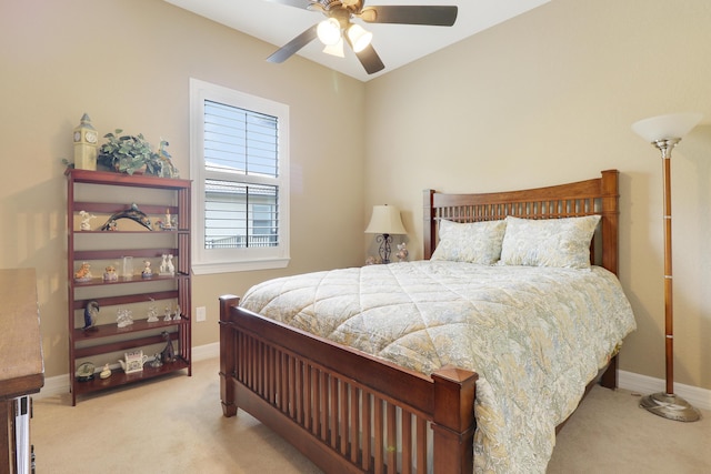 4885 SW Gossamer Cir, Palm City, FL 34990 - carpeted bedroom with baseboards and ceiling fan