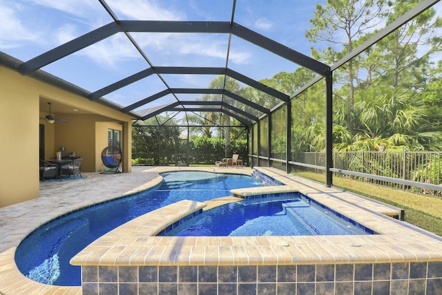 4885 SW Gossamer Cir, Palm City, FL 34990 - view of swimming pool with ceiling fan, a patio, a pool with connected hot tub, and fence