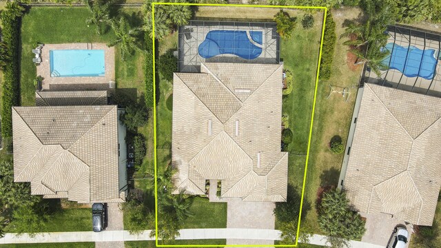 4885 SW Gossamer Cir, Palm City, FL 34990 - aerial overview of property's location with a pool area and property parcel outlined