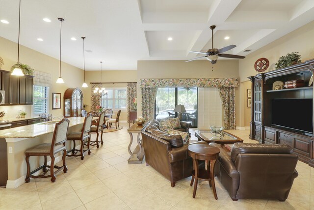 4885 SW Gossamer Cir, Palm City, FL 34990 - living room featuring ceiling fan, recessed lighting, coffered ceiling, light tile patterned floors, and beam ceiling