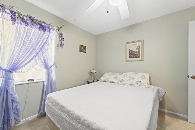 7302 Banyan St, Fort Pierce, FL 34951 - bedroom featuring light carpet, baseboards, and ceiling fan