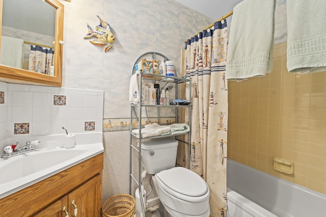 7302 Banyan St, Fort Pierce, FL 34951 - bathroom featuring toilet, tile walls, shower / tub combo with curtain, and vanity