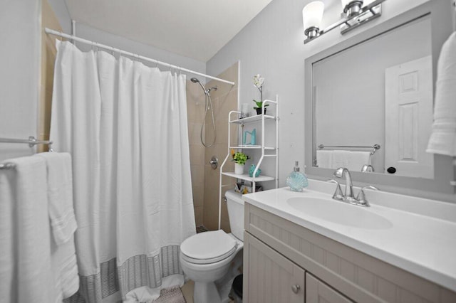 2600 SE Ocean Blvd Unit Jj-6, Stuart, FL 34996 - full bathroom featuring toilet, vanity, and a shower with curtain