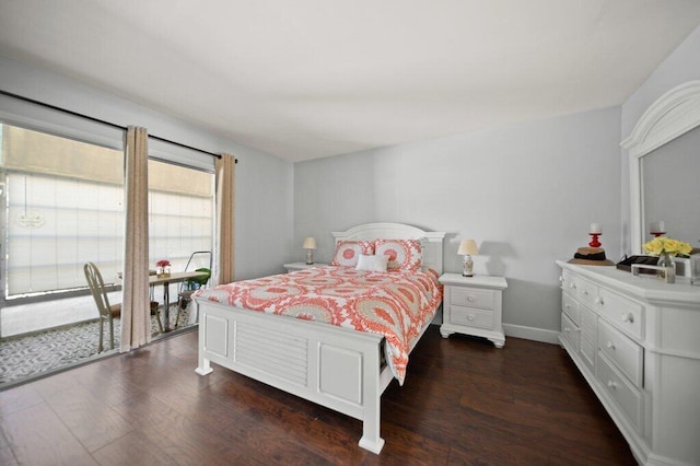 2600 SE Ocean Blvd Unit Jj-6, Stuart, FL 34996 - bedroom with dark wood-style flooring and baseboards