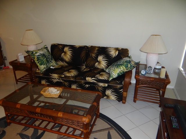 12005 Poinciana Blvd Unit 103, Royal Palm Beach, FL 33411 - living area with tile patterned flooring and baseboards