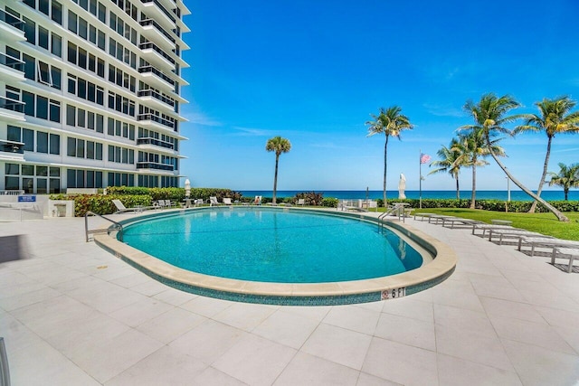 community pool with a water view