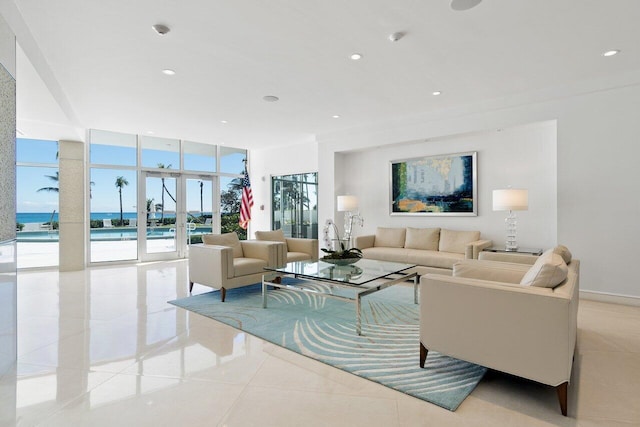 building lobby with floor to ceiling windows and recessed lighting