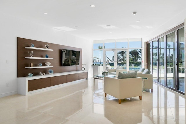 living room with healthy amount of natural light, light tile patterned floors, and recessed lighting