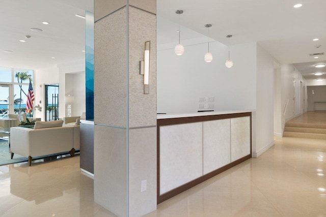 reception featuring recessed lighting