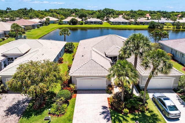 aerial view of residential area with a nearby body of water