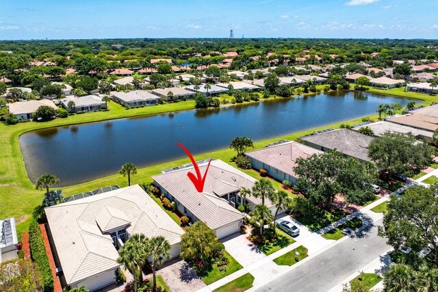 aerial view of residential area with a nearby body of water
