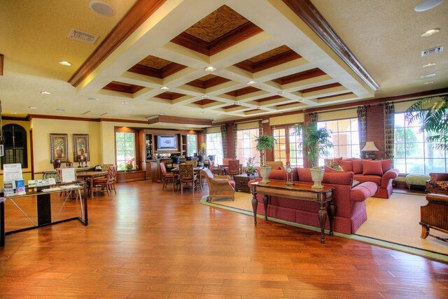 117 Yacht Club Way Unit 205, Hypoluxo, FL 33462 - building lobby featuring ornamental molding, beam ceiling, coffered ceiling, and recessed lighting