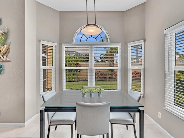 tiled dining space with baseboards