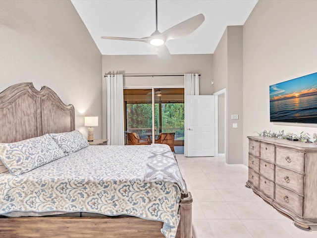 bedroom featuring access to exterior, light tile patterned floors, and a ceiling fan