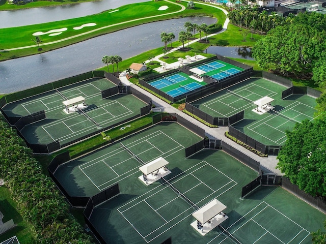 bird's eye view of a nearby body of water and a golf club