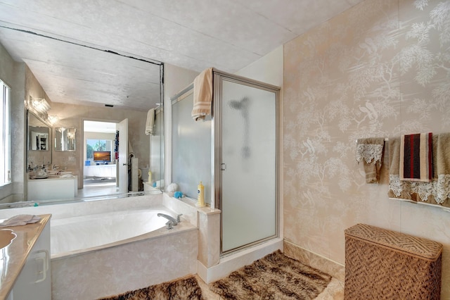 5876 Regal Glen Dr Unit 209, Boynton Beach, FL 33437 - bathroom featuring vanity, a stall shower, a garden tub, and wallpapered walls