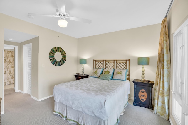 bedroom with carpet, baseboards, and ceiling fan