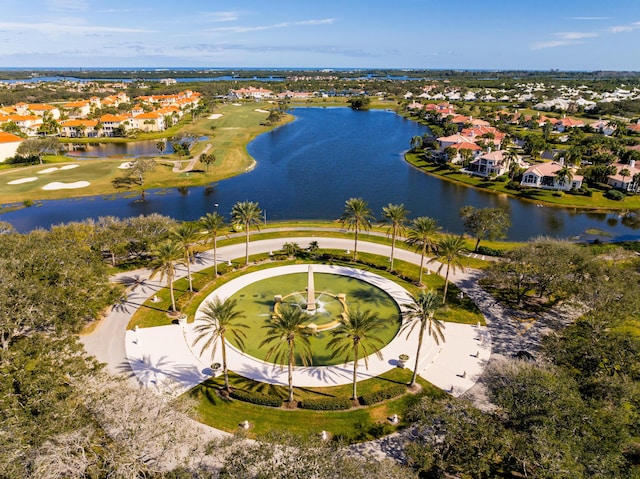 aerial view of residential area with a large body of water and a golf club