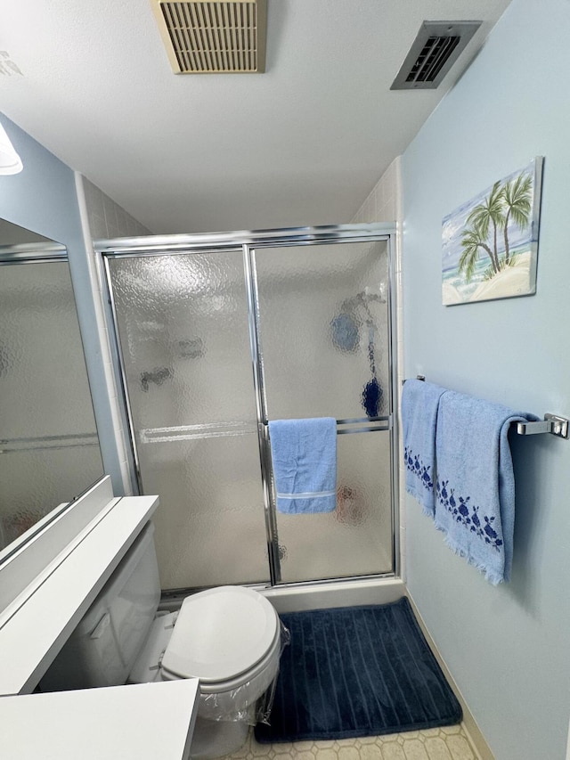 326 Knotty Pine Cir Unit C-2, Greenacres, FL 33463 - bathroom featuring a shower stall and toilet